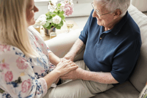 Daughter and father holding hands