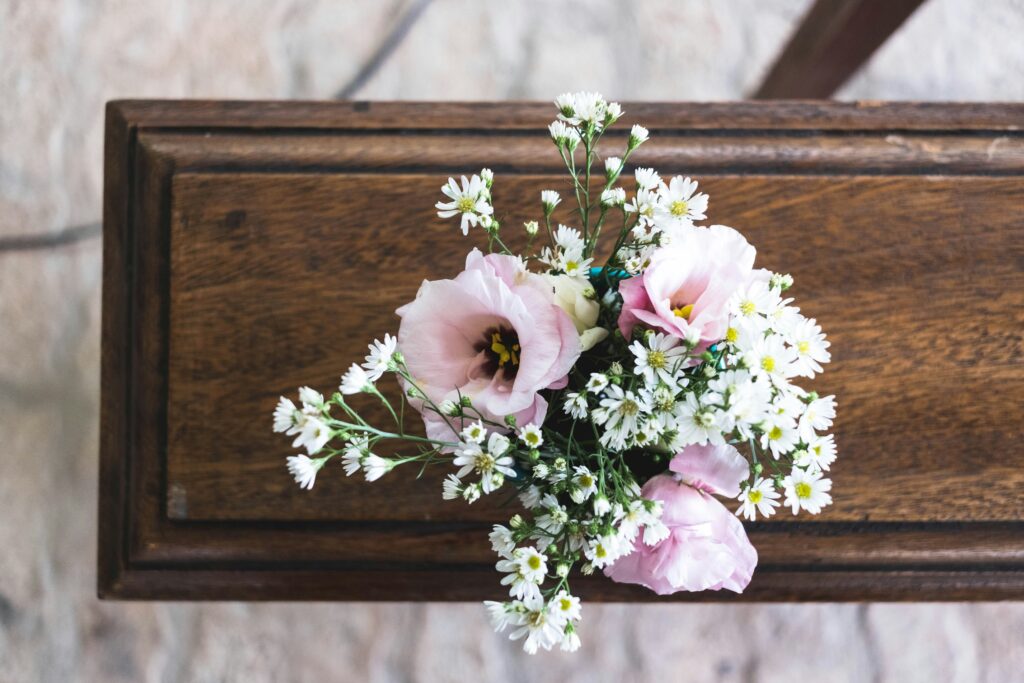 Flower sitting on top of a casket